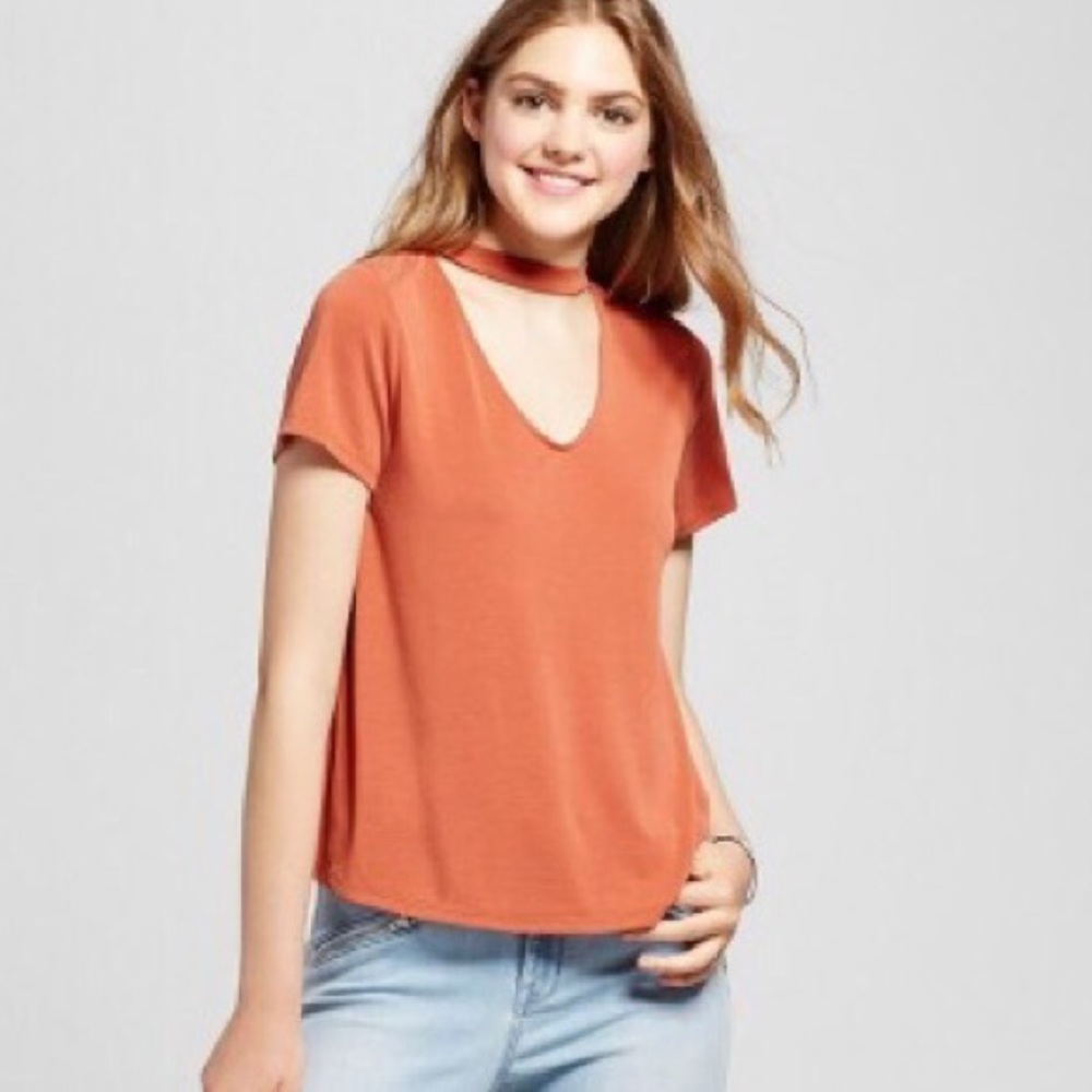 burnt orange shirt
